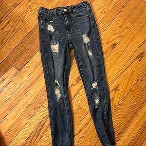 Guess Women's 1981 Vintage Los Angeles Distressed Blue Jeans.
